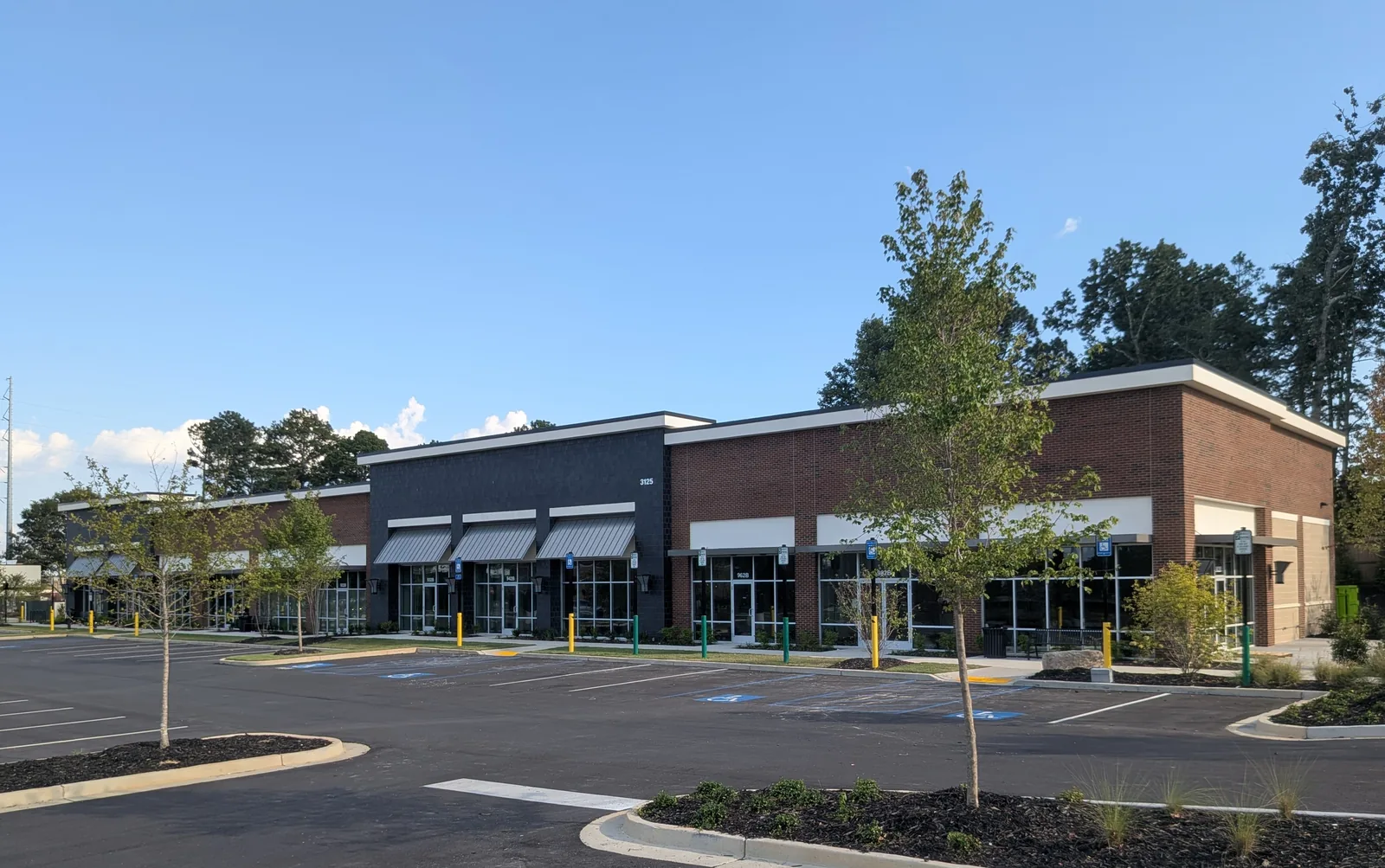 Inline retail buildings and unbranded storefronts at Forsyth Town Center